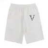 Calças de praia 2022 Brand Shorts de verão Moda masculina Correndo um processo rápido de lavagem a seco de shorts de tecido de algodão puro