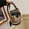 Whole factory ladies shoulder bags sweet cute bear graffiti bucket bag street trend cylinder women ribbon handbag European pop310y