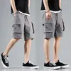 Mäns shorts 2023 Mäns militärlast Solid Multi Pocket Casual Fitness Loose Work Pants Summer Male Tactical Jogge