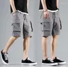 Mäns shorts 2023 Mäns militärlast Solid Multi Pocket Casual Fitness Loose Work Pants Summer Male Tactical Jogge