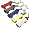 RRA915 Mini Skateboard Keychain - Removable Metal Scooter Toy for Christmas Gifts and Party Favors