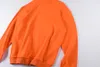 オレンジ色のフーディーズスウェットシャツプラスサイズの男性レディースパフレタープリントヒップホップフリースメンズトップ23SS