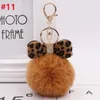 New Leopard Bow Plush keychain Charm Fluffy Faux Rabbit Fur Ball Ball Chains Women Hands Handrants Car Key Ring Beakenchains Crystal Bow Jewelry