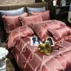 Set di biancheria da letto Set copripiumino da sposa a goccia a righe Set copripiumino in jacquard dorato Federa 4 pezzi Rosso europeo di lusso