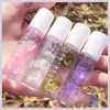 Lipgloss 1 stc/4pcs bloem bloemblad olie moisturizer transparante vloeistof make -up lippen zorgbehandelingen cosmetica tslm1