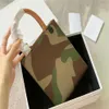 Specialized Fashion Designer Triomphe Mini Cabas Totes Camouflage Small Women Cellphone Tote Leather Handle Flap Long Strap Should3170