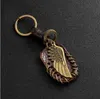 Fashion Vintage Brown Genuine Leather Wing Compass Music Symbol Keychain Charm Handwork Alloy Accessories Men Key Chain