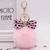 New Leopard Bow Plush keychain Charm Fluffy Faux Rabbit Fur Ball Ball Chains Women Hands Handrants Car Key Ring Beakenchains Crystal Bow Jewelry