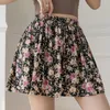 Shorts pour femmes Mini jupes fleur mode femmes jupe courte en mousseline de soie volants Boho imprimé fleuri Sexy taille haute grande taille plage imprimé