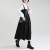 Robes décontractées Vêtements pour femmes d'automne 2023 Fashion Little Black Robe Brouchons French Cempulement Design Sense of Loose Big Swing