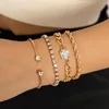 Cazibe bilezikler ingesight.z 4pcs/set full rhinestone bükülme zinciri bilezik kadınlar için punk altın rengi Küba pençesi açık