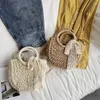 Bolsas de noite de verão Crosso de palha infantil para mulheres redondo manusear bolsas tecidas e designer de luxo ombro de praia