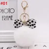 New Leopard Bow Plush keychain Charm Fluffy Faux Rabbit Fur Ball Ball Chains Women Hands Handrants Car Key Ring Beakenchains Crystal Bow Jewelry