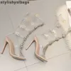 Sandały damskie buty na wysokim obcasie buty Sexy kobiety szpilki projekt Rhinestone pcv przezroczyste sandały na szpilkach buty kryształ t-strap 010423H