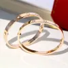 Bracciale rigido in oro con diamanti e cacciavite in acciaio inossidabile 316L placcato di lusso per donne amanti degli uomini Moda unisex Movimento attuale anni '80