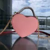 Сумки на плечах роскошные сумочки дизайнерские сумки кожаные сумки по кроссту жены мода сердце розовые кошельки для торговых точек сеть пляжные сумки сумки 230104
