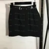 Falda de camiseta negra para mujer, minifaldas transparentes de malla sexy, minifaldas de tiro alto