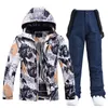 Menina de esqui de trajes masculinos Men Winter Winter Warde Prooftronet à prova d'água esportiva de neve e calça Jaquetas de snowboard Mulheres