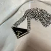 Cabello Diseñador Joyería Collares Cadenas de cadena Enlace de joyería de lujo Carta de joyas triangulares Amor personal personalizado Pendientes Mujeres Acero inoxidable para mujeres