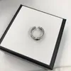 Designer de luxo Ring Rings Silver Metal Anéis de moda Carta de marca de moda Anéis simétricos Lady Mulheres Party Wedding Gift Engagement 2301051qs