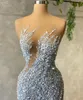 2024 2024 New Sparkly Blue Sequins Beaded Mermaid Prom Dresses Sexy Sheer Neck Plus Size Sweep Train Formal Evening Ocn Gowns New