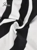 Kvinnors jumpsuits Rompers Jokaa Black White Stripe Hollow Out Long Sleeve Trend Jumpsuit Women Fashion Fitness Sports Bodycon Romper Sexig Streetwear 230104