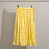Kjolar våren och sommaren kvinnors västerländska stil pläden casual gul slips a-line kjol insskirts