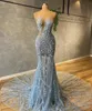 2024 2024 New Sparkly Blue Sequins Beaded Mermaid Prom Dresses Sexy Sheer Neck Plus Size Sweep Train Formal Evening Ocn Gowns New