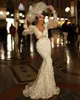 Elfenben sjöjungfru eleganta bröllopsklänningar illusion lykta ärm brudklänning skräddarsydd mode spets vestido de novia