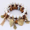 Bangle Fashion Baitao Retro Multi- Pendant Temperament Multi-layer Wood Bead Tassel Alloy Combination Bracelet Woman