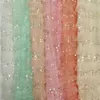 衣料品のスパンコール刺繍チュールメッシュレース縫製ドレスウェディングガウンホワイトピンクピーチグリーン庭