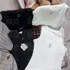 Maglietta da donna corta Canotta in maglia senza maniche sexy Top Canotte in maglia nera bianca