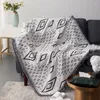 Coprisedia Coperte Coperta con motivo geometrico bohémien Coperta in filo per divano/letto/aereo Copriletto decorativo lavorato a maglia con nappa