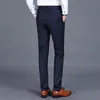 メンズパンツ秋と春の高品質の商品男性純粋な色のフォーマルビジネススーツ薄い高品質の男性cxasualズボン