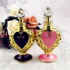 12 ml metall parfymflaska Royal Heart Formed Essential Oils Bottle With Droper Hollowed Out Alloy Wedding Gift Decoration231f
