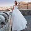 2023 Abiti da sposa arabi sexy con spalle scoperte Appliques di pizzo Perline Maniche lunghe Sweep Train Puffy Tulle Aperto Ba9531240