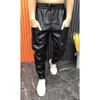 Męskie spodnie skórzane elastyczne talia Faux Joggers Pockets Black Streetwear Slim Pencil Spit Ubranie 230105