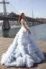 Stuning Tiered Tulle Princess Prom Dresses With Short Sleeves High Collar Dubai Arabia Formal Party Princess Ball Gowns Lace Beaded Modern Women Evening Wear CL1652