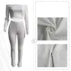 Tute all'ingrosso Donna Completi a due pezzi Autunno Inverno Completi a costine Manica lunga Slash Neck Pullover Crop Top e pantaloni Set coordinati Casual Tute sportive solide