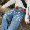 Jeans masculinos A1340 Graffiti impresso masculino e feminino calças letas de perna larga de pernas largas calças coreanas