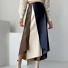 Saias de cintura alta preto bloco colorido de couro pu longa saia irregular feminina moda maré primavera outono 2023