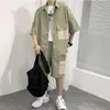 Roupa térmica masculina 2023 Conjuntos de verão Camisa e shorts moda moda de tamanho grande algodão de retalhos de algodão Carga de bolso de manga curta Casual Street