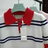 Casual Dresses designer Red and white contrast double G hollow stripe tencel cotton red POLO neck knitted dress KDI4