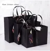 Kraft Paper Shopping Jewelry Boxes Wedding Party Favor Merchandise Retail Sacks Black Paper Gift Bags with Handles Bulk