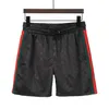 Designer mens shorts estilo impermeável tecido trackpants verão praia calças mensurf troncos de natação esportes tamanho asiático