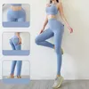 Aktywne spodnie TOP Kobiet Seksowne jogie sportowe legginsy siłownia moda ladiesowa kieszonkowa fitness miękki oddychający bioder