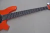 Orange 5 strängar elektrisk basgitarr med svart pickguard rosentavla