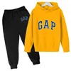 Giyim setleri moda markası çocuk sporu gündelik giyim hoodies sweater pantolon erkek ve kızlar özel satış açık spor giyim 230106
