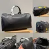 Nya Duffel Bags Designer Bagagväskor Luxurys Handväska Hög kapacitet Tygväskan Läder Luxury Crossbody Unisex Bagage 221029