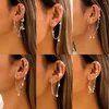 Dos boucles d'oreilles en longue étoile-lune gland Imitation perle unique oreille-crochet oreille bijoux Simple papillon sans trou pour les femmes